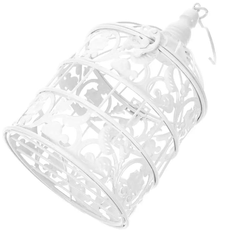 Chic bird cage decor: Vintage-inspired candle holder, stylish home accent.