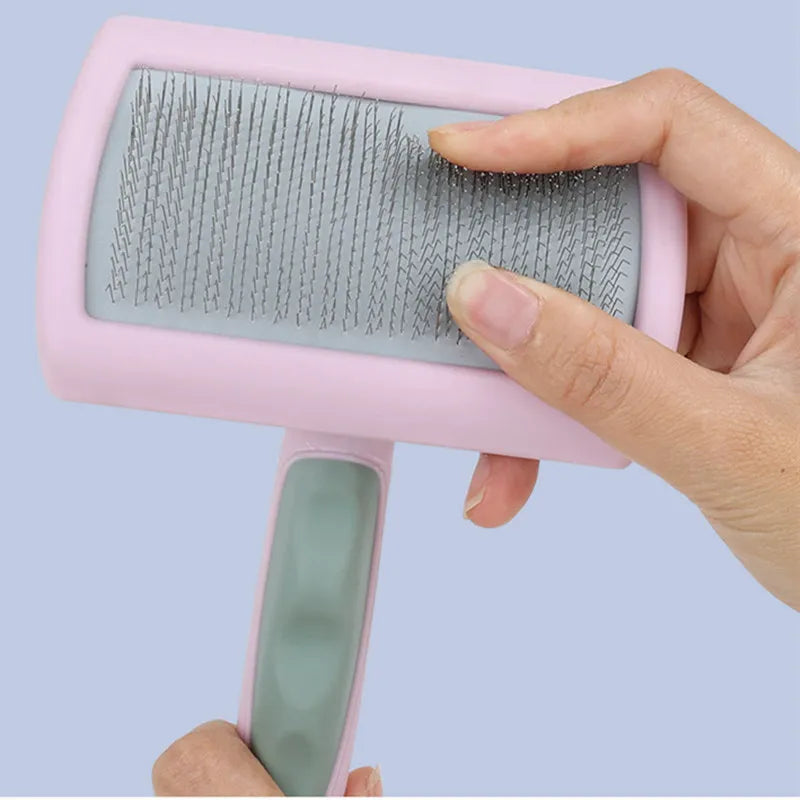 Dog Grooming Brush: Stainless steel, massage comb, removes pet hair efficiently.