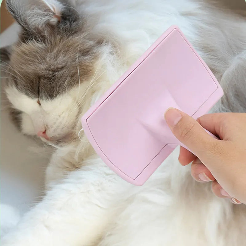 Dog Grooming Brush: Stainless steel, massage comb, removes pet hair efficiently.