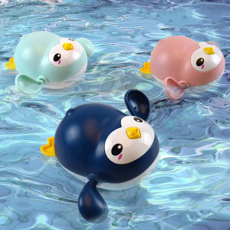Summer bath toys: Clockwork dolls for kids' bathtub fun.