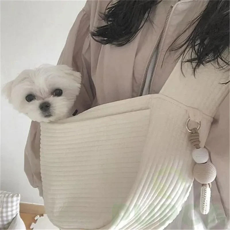 Handmade Pet Carrier: Canvas shoulder bag for pets during travel.