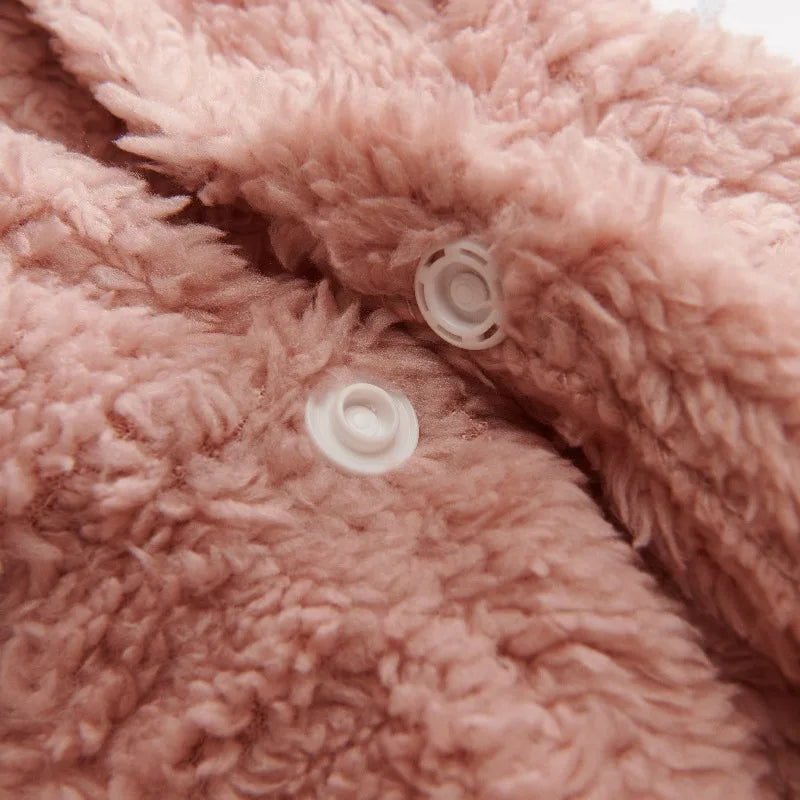 Winter Dog Hoodie: Soft fleece coat for your furry friend.