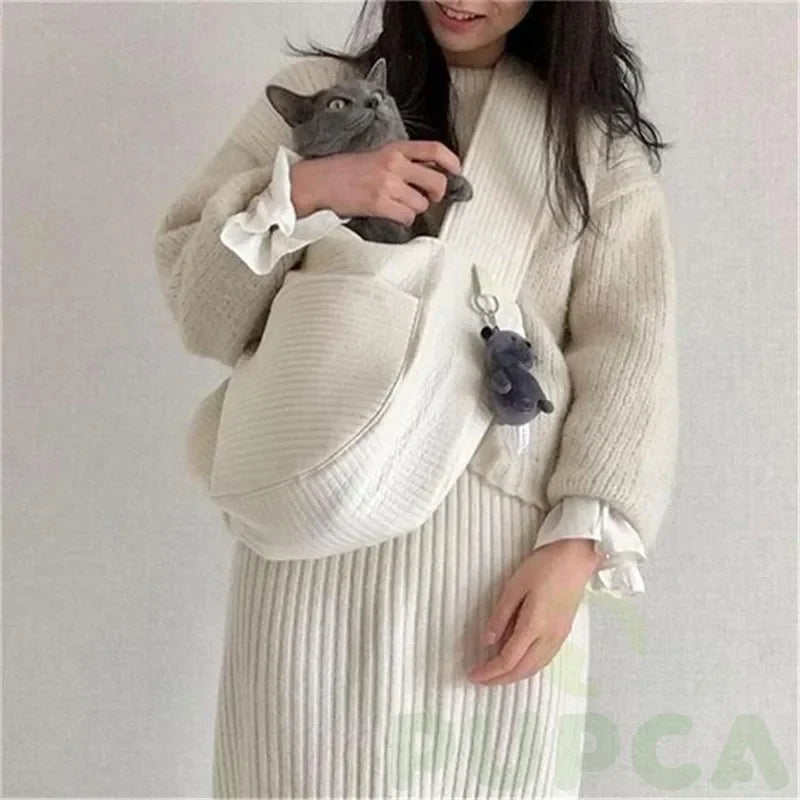 Handmade Pet Carrier: Canvas shoulder bag for pets during travel.
