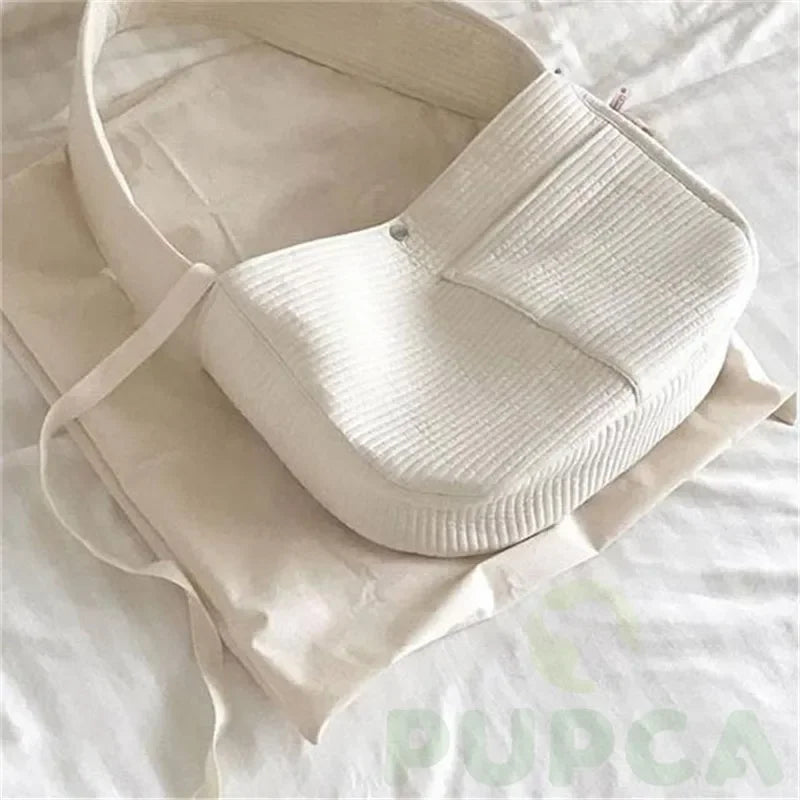 Handmade Pet Carrier: Canvas shoulder bag for pets during travel.